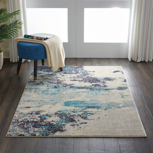 2' X 4' Ivory And Teal Blue Abstract Power Loom Non Skid Area Rug